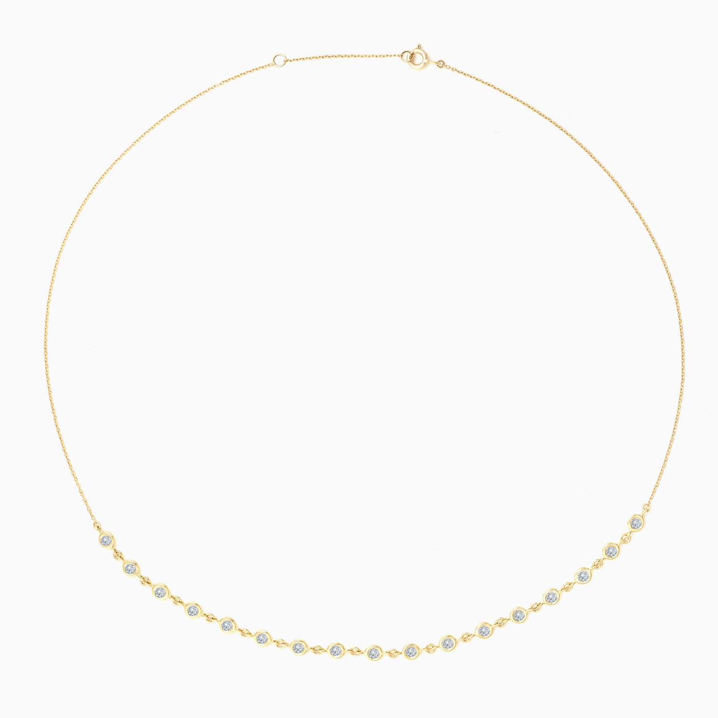 ESSENTIAL BEZEL HALF TENNIS NECKLACE is a bezel set diamond tennis necklace in 18kt yellow gold