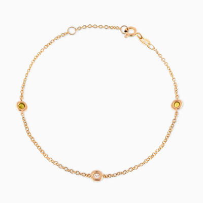 ESSENTIAL DIAMOND & CITRINE BEZEL BRACELET in 18kt yellow gold features one diamond and two YELLOW CITRINE. 