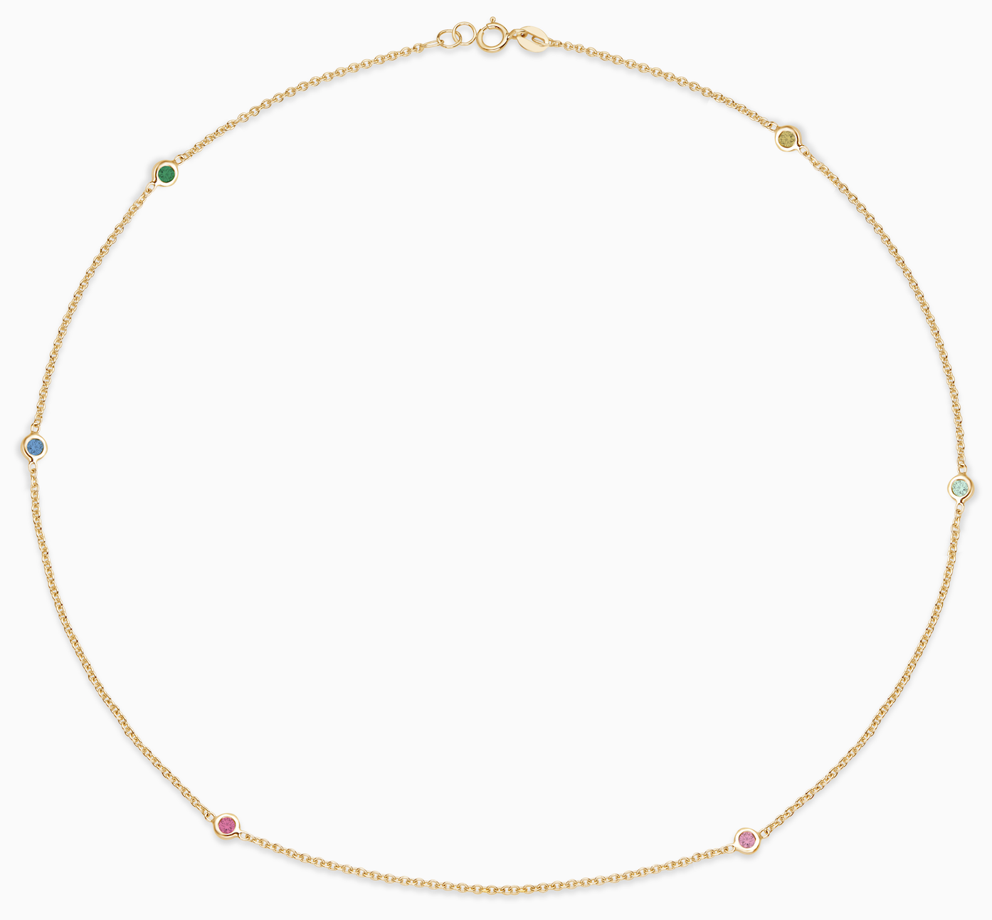 Essential Multigem Bezel Necklace is a necklace made in 18kt yellow gold with an emerald, sapphire, ruby, pink sapphire, topaz and a citrine in bezel setting. 