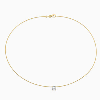 Essential Solitaire Necklace is an omega chain with a cushion cut diamond in 18kt yellow gold. 