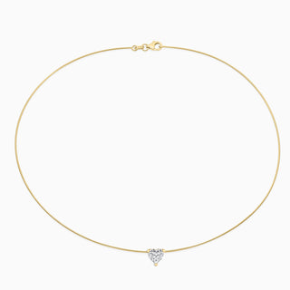 Essential Solitaire Necklace is an omega chain with a heart cut diamond in 18kt yellow gold. 