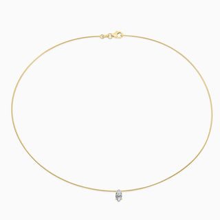 Essential Solitaire Necklace is an omega chain with a marquise cut diamond in 18kt yellow gold. 