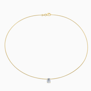 Essential Solitaire Necklace is an omega chain with a oval cut diamond in 18kt yellow gold. 