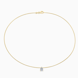 Essential Solitaire Necklace is an omega chain with a pear cut diamond in 18kt yellow gold. 