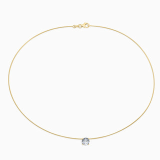 Essential Solitaire Necklace is an omega chain with a round brilliant cut diamond in 18kt yellow gold. 
