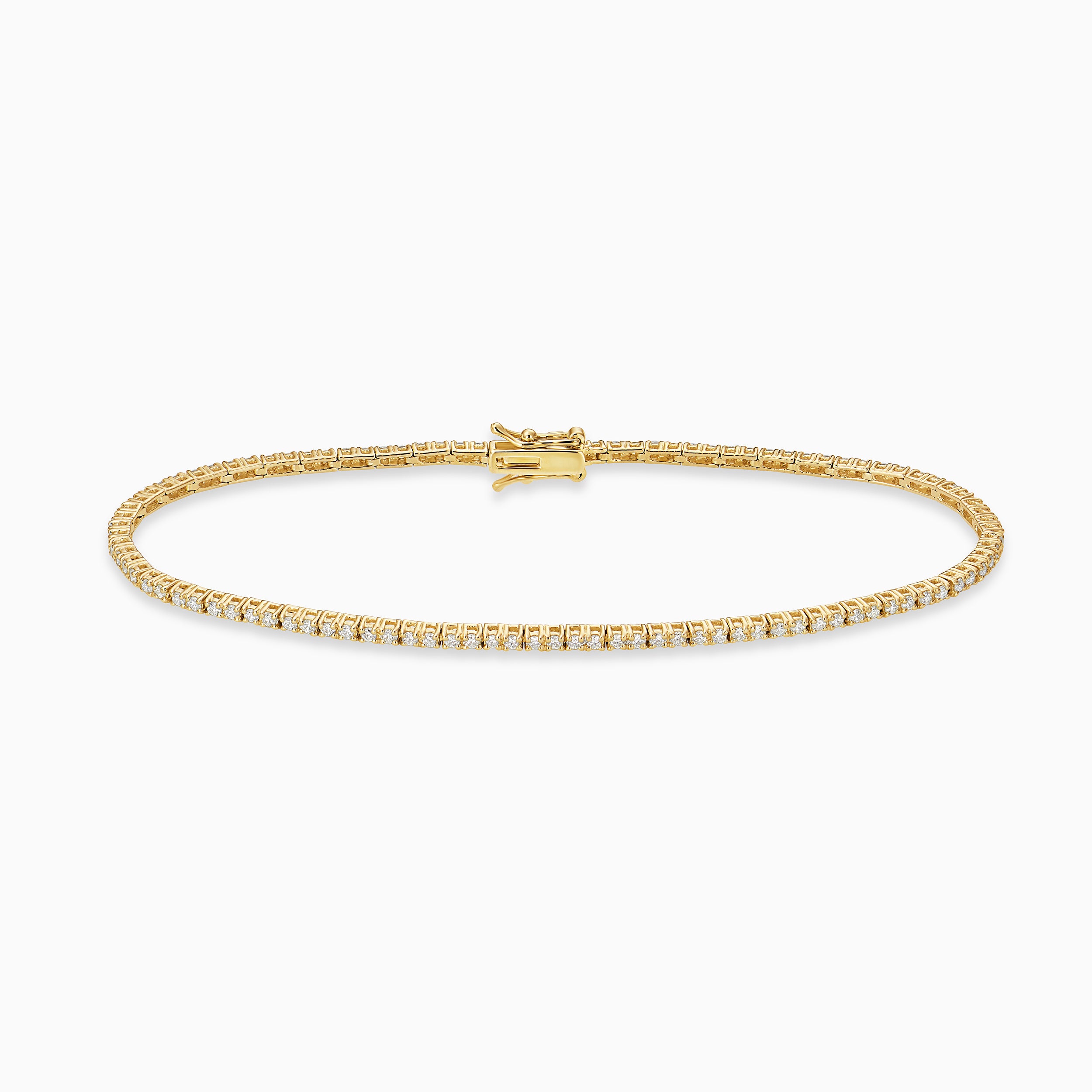 Essential Tennis Bracelet is a classic tennis bracelet with diamonds set in 18kt yellow gold. 