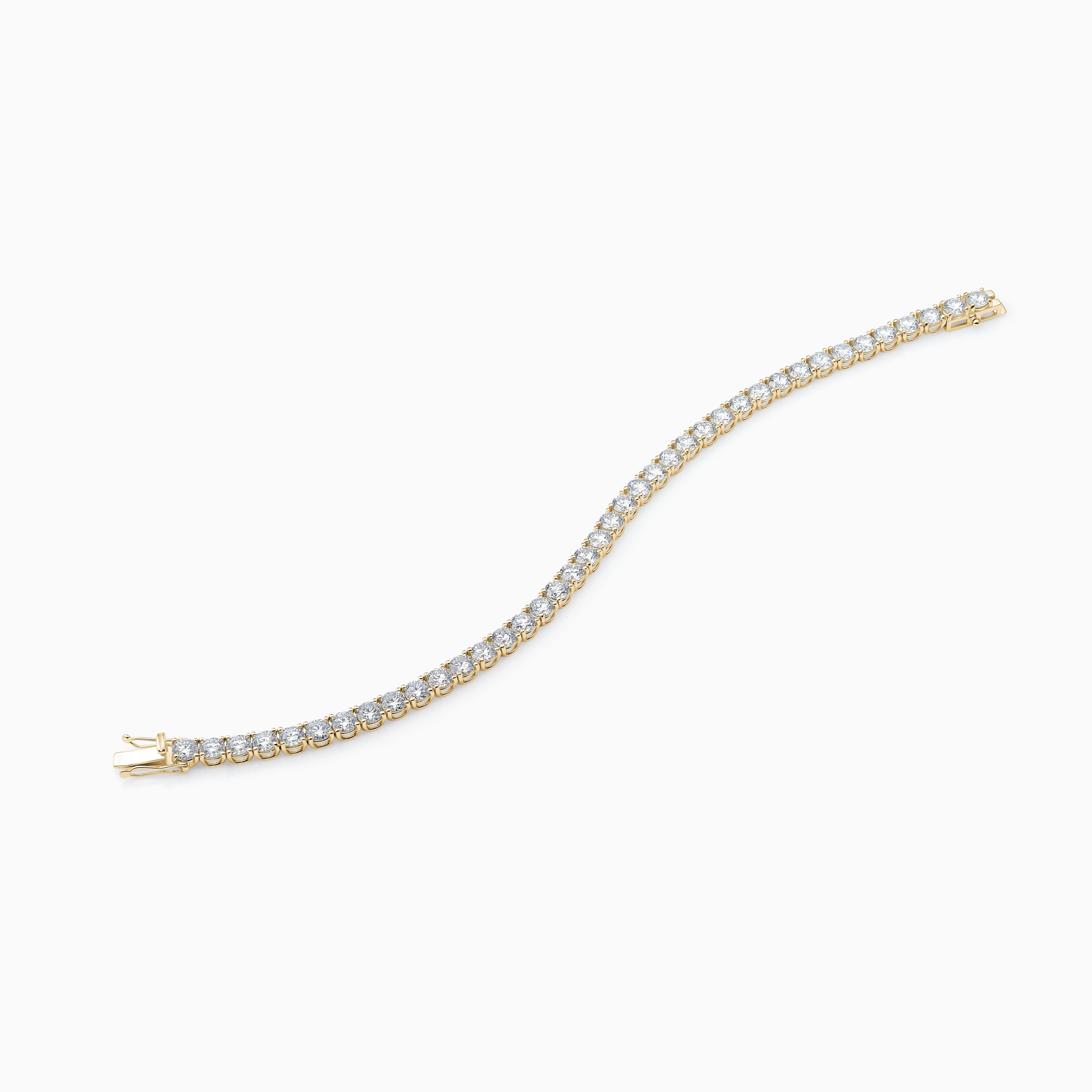 Essential Tennis Bracelet is a classic tennis bracelet with diamonds set in 18kt yellow gold. 