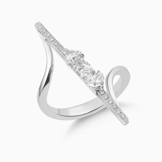 Dizzy Delight Ring is a ring with oval and heart shaped diamonds together in 18kt white gold.