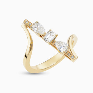 Dizzy Flirt Ring with pear and emerald shaped diamonds on an 18kt yellow ring 