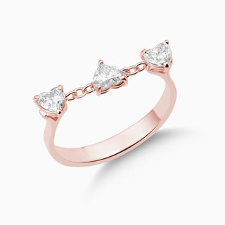 Dizzy heart ring featured 3 heart shaped diamonds on a chain in 18kt rose gold. 
