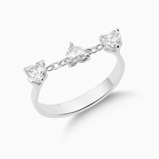 Dizzy hearts ring is an 18kt white gold ring featuring 3 heart shaped diamonds held together by a chain in the middle.