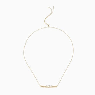 Dizzy Slide Necklace is made in 18kt yellow gold with diamonds moving on a diamond line