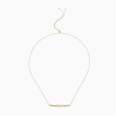 Dizzy Slide Necklace is made in 18kt yellow gold with diamonds moving on a diamond line