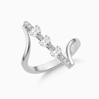 Dizzy Valentines ring is made in 18kt white gold with 3 heart shaped diamonds going up and down. 