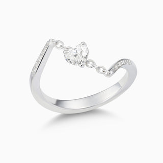 dizzy in love is a 18kt white gold ring featuring a heart shape diamond on a chain. 