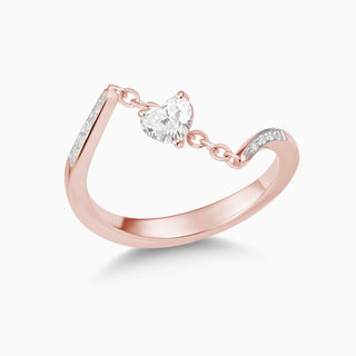 Dizzy in Love is a single heart shape diamond help by a chain, made in 18kt rose gold. 