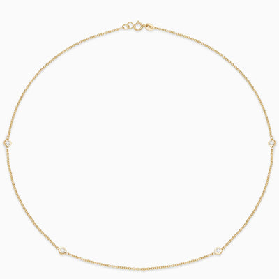 Essential Diamond Bezel Necklace in 18kt gold yellow gold with 4 diamonds. 