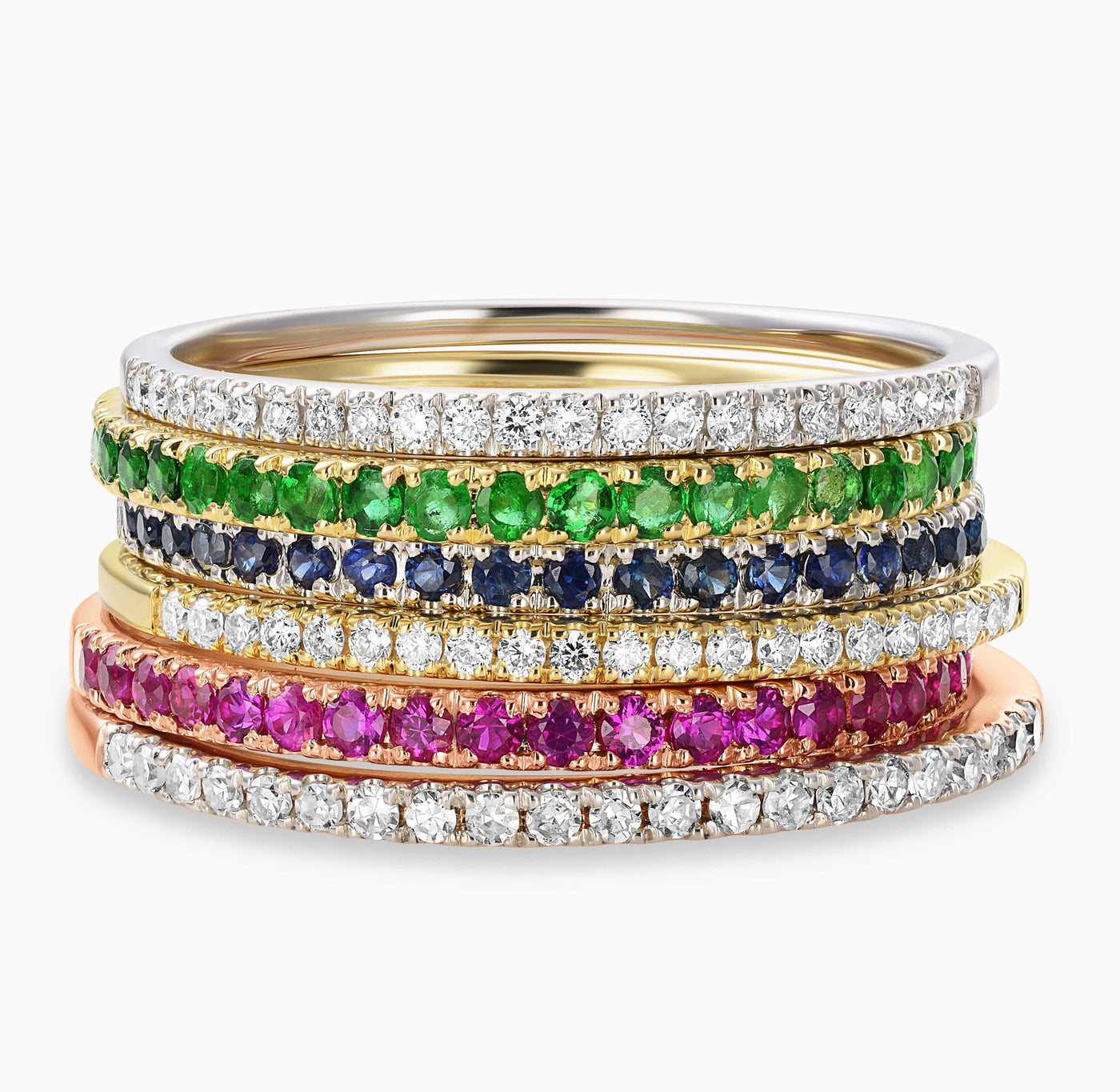 
Essential Slim Diamond Band in 18kt Yellow Gold, 18kt White Gold and 18kt Rose Gold mixed with Essential Slim Ruby Band in 18kt rose gold, Essential Slim Sapphire Band in 18kt white gold and Essential Slim Emerald Band in 18kt yellow gold.
