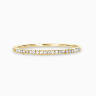 Essential Slim Diamond Band is a thin band with diamonds set in 18kt yellow gold