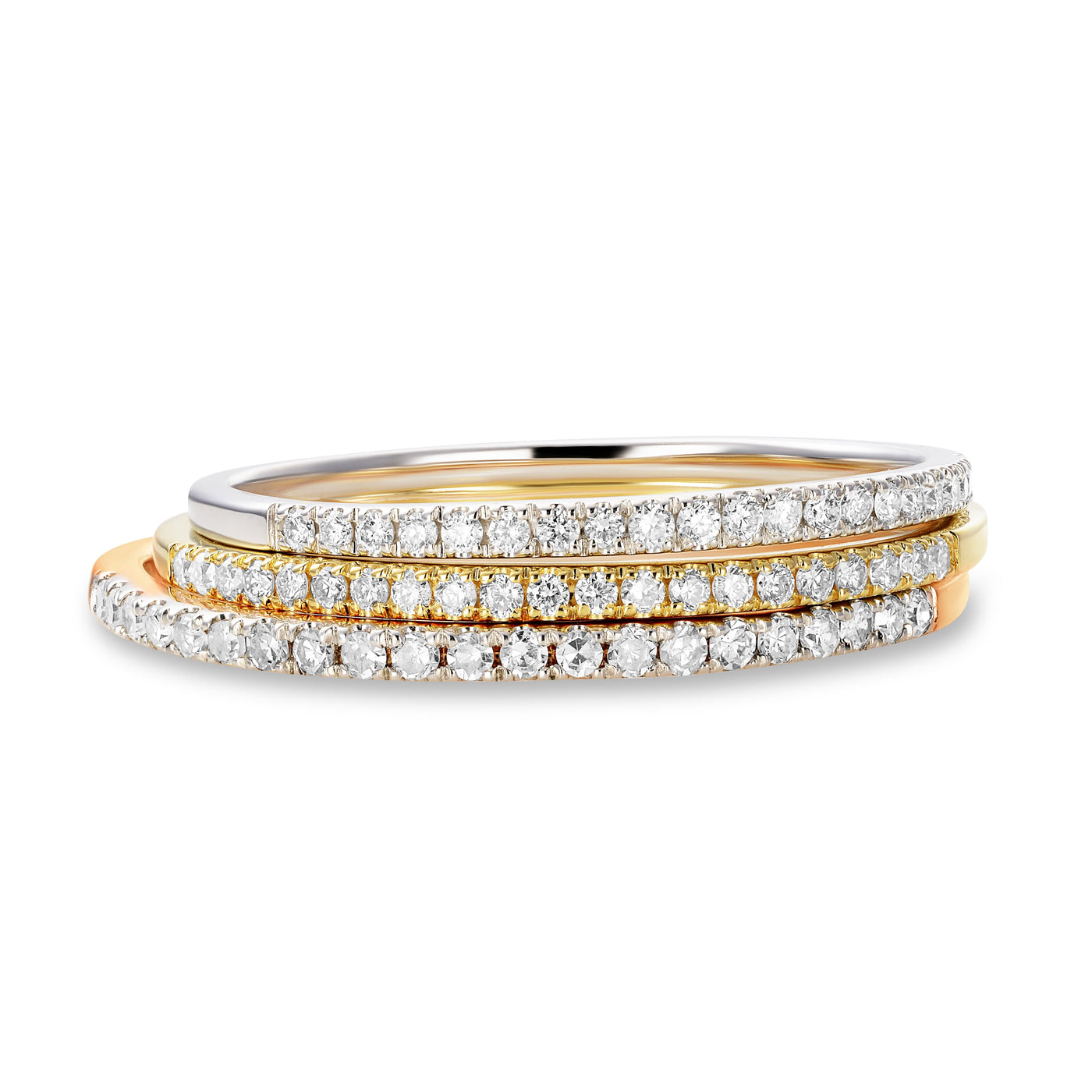 A tricolor set of 3 essential slim diamond bands in 18kt yellow gold, rose gold and white gold. 