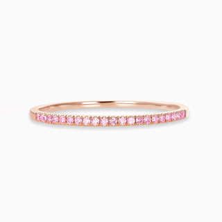 Essential Slim Pink Sapphire Band is a thin band of pink sapphires set in 18kt rose gold. 