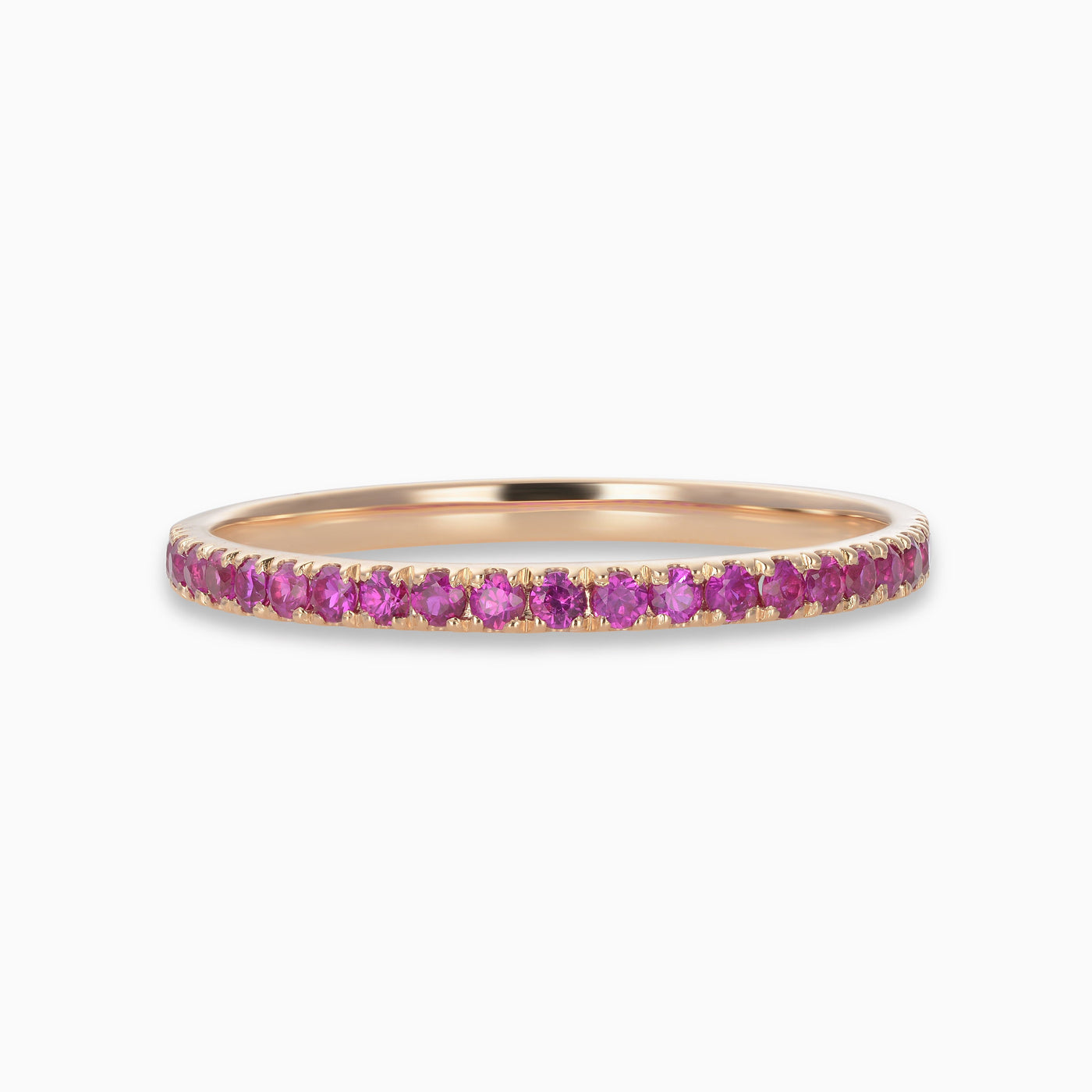 Essential Slim Ruby Band is a thin line of rubies set in 18kt rose gold. 