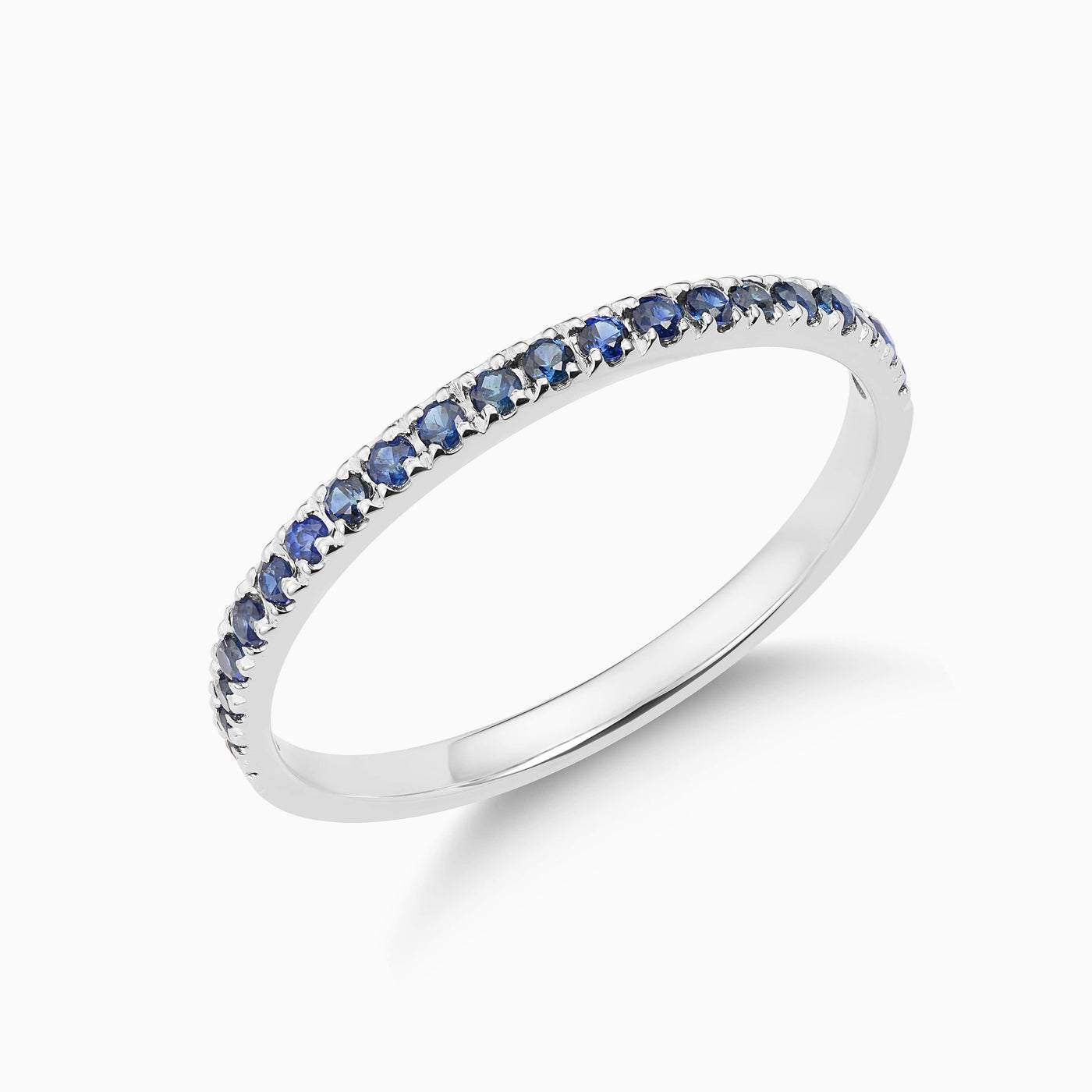 Essential Slim Sapphire Band is a thin band of sapphires, made in 18kt white gold. 